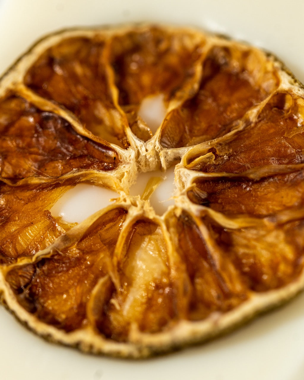 Dried orange slice on a white background