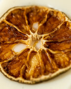 Dried orange slice on a white background
