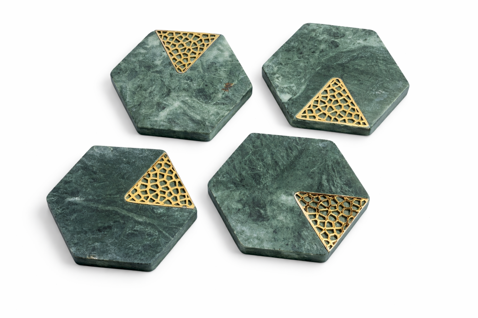 Four hexagonal green marble coasters with gold geometric design