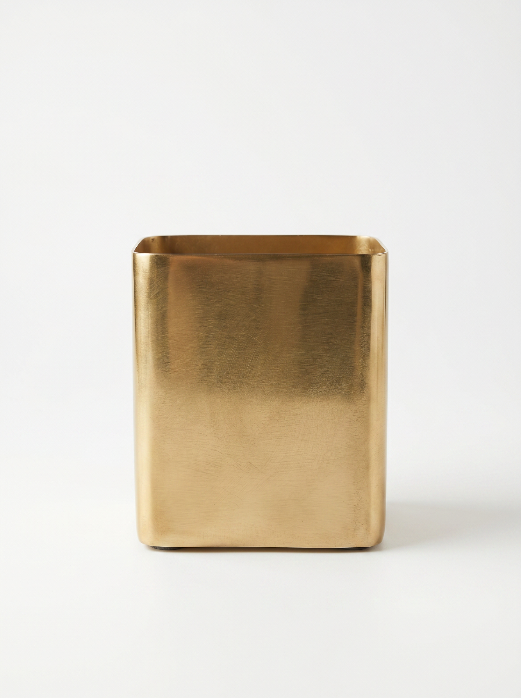 Gold rectangular planter on a white background