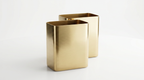 Two gold rectangular vases on a white background