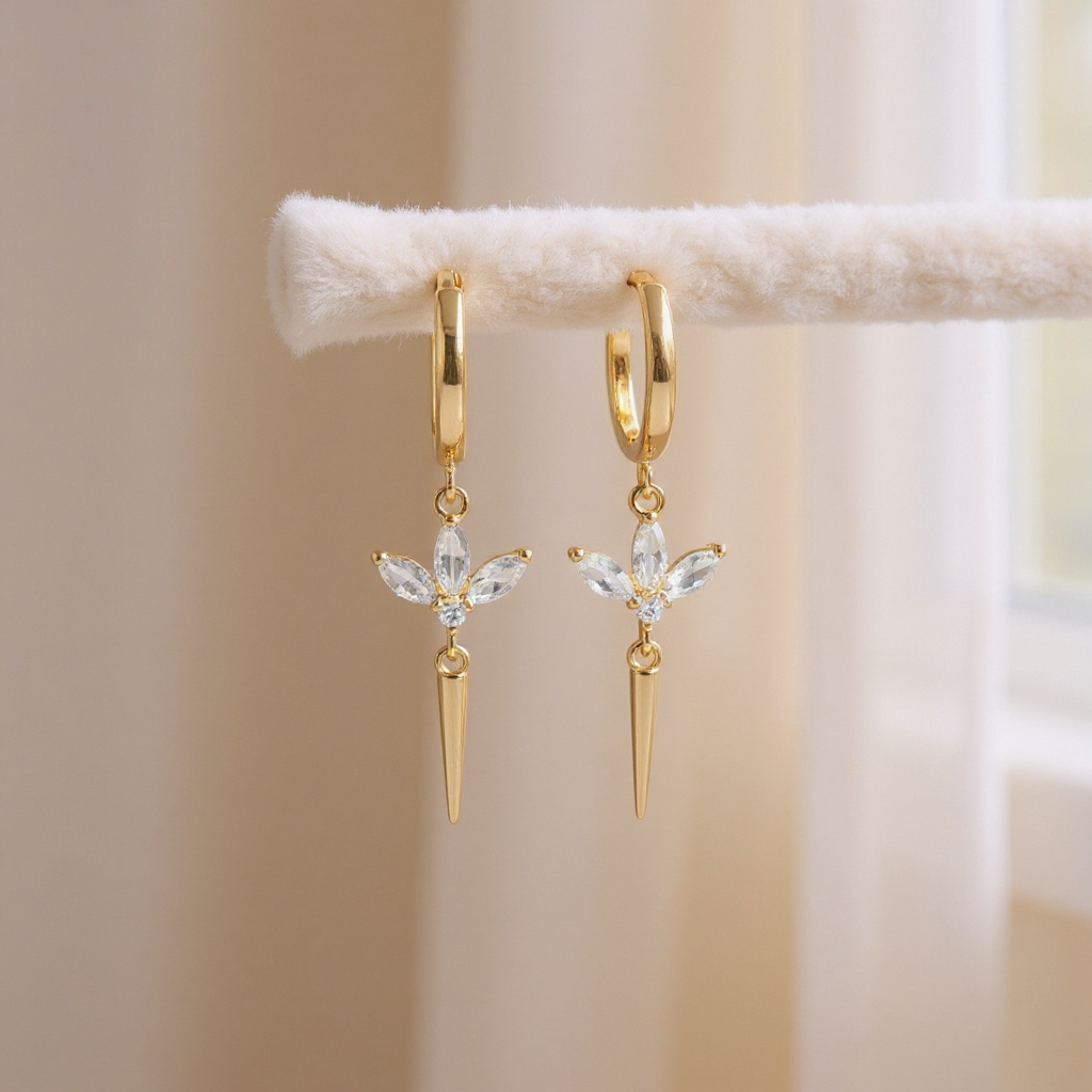 Gold earrings with floral and spike design