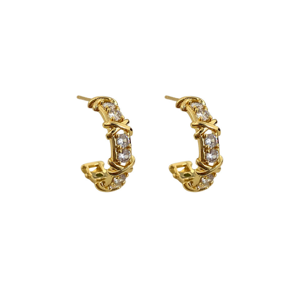 Gold hoop earrings with embedded diamonds 