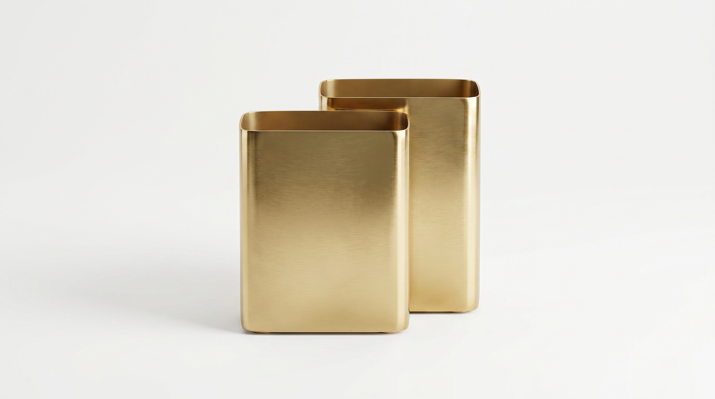 Two gold rectangular containers on a white background