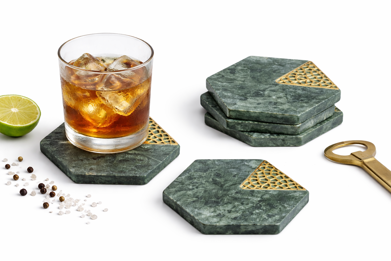 Hexagonal green marble coasters with gold accents holding a glass of iced tea .