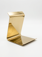 Gold geometric Phone holder on a white background