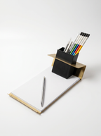 Pencil holder with pens on a white background