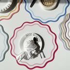 Placemat with a breakfast plate .