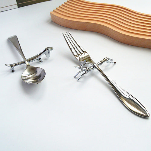 Spoon rest with spoon and fork