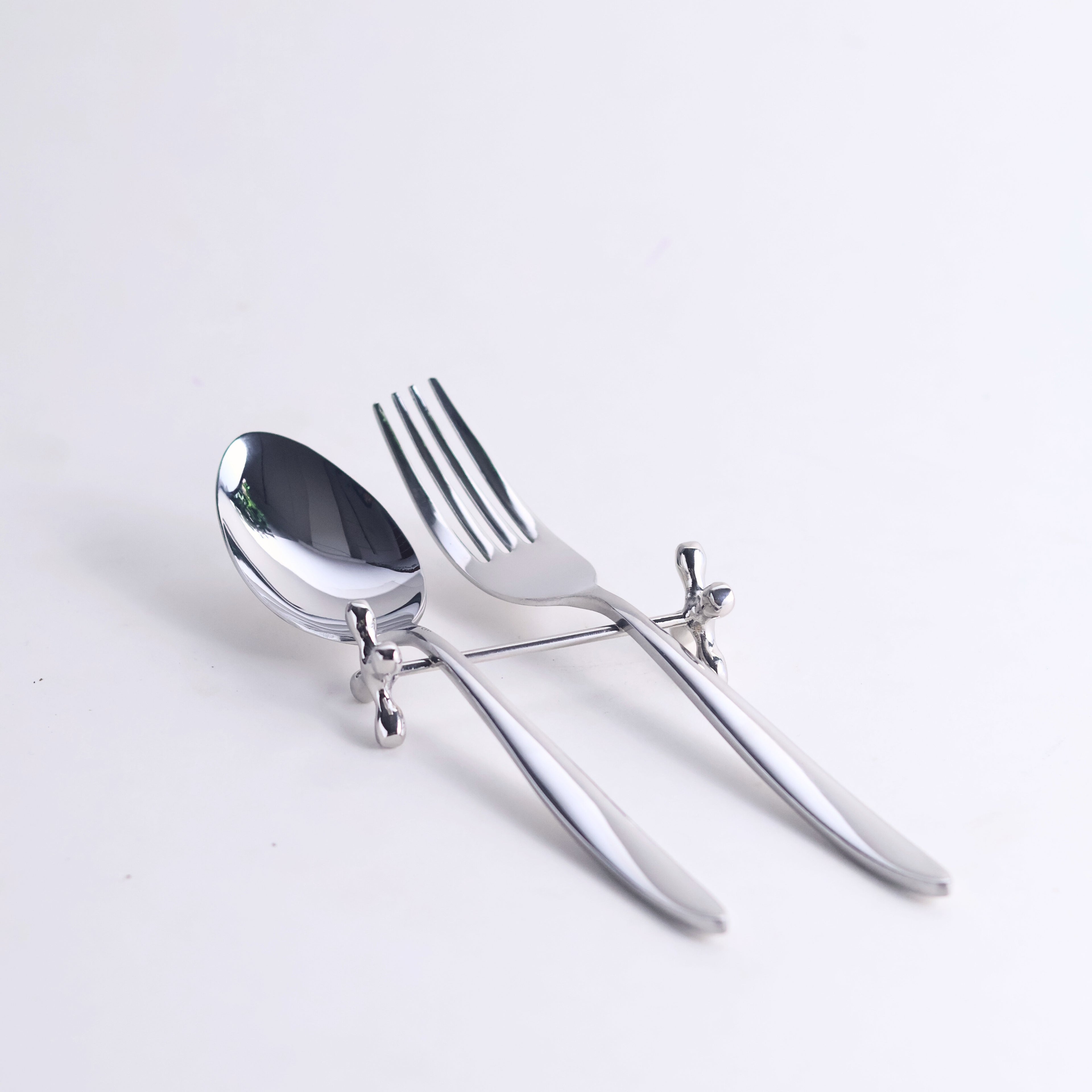Spoon rest with fork and spoon