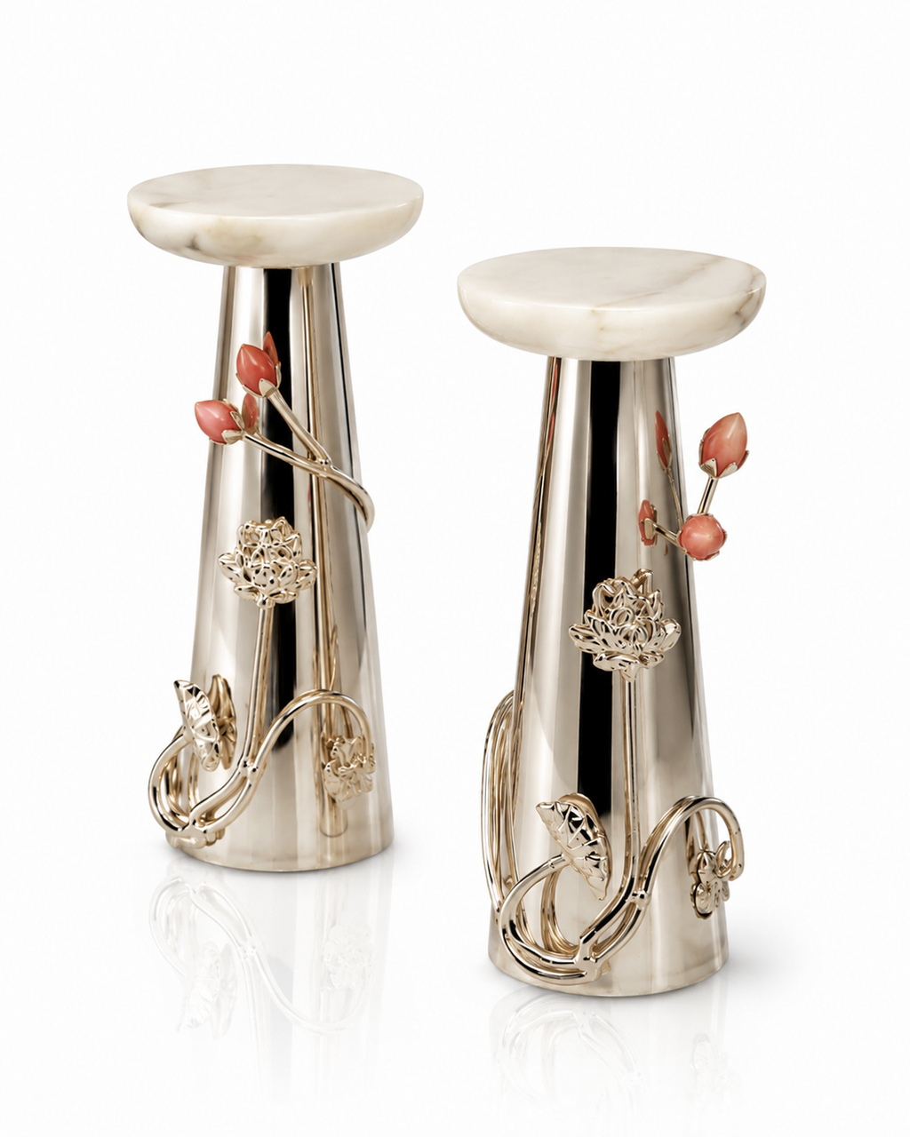 A pair of elegant Silver-colored metal pedestal vases with white marble tops, decorated with pink coral floral accents and gold-toned bird motifs, set against a clean white background.