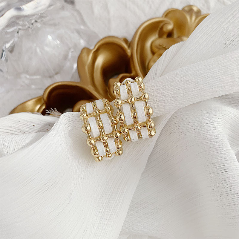 Gold and White Earrings