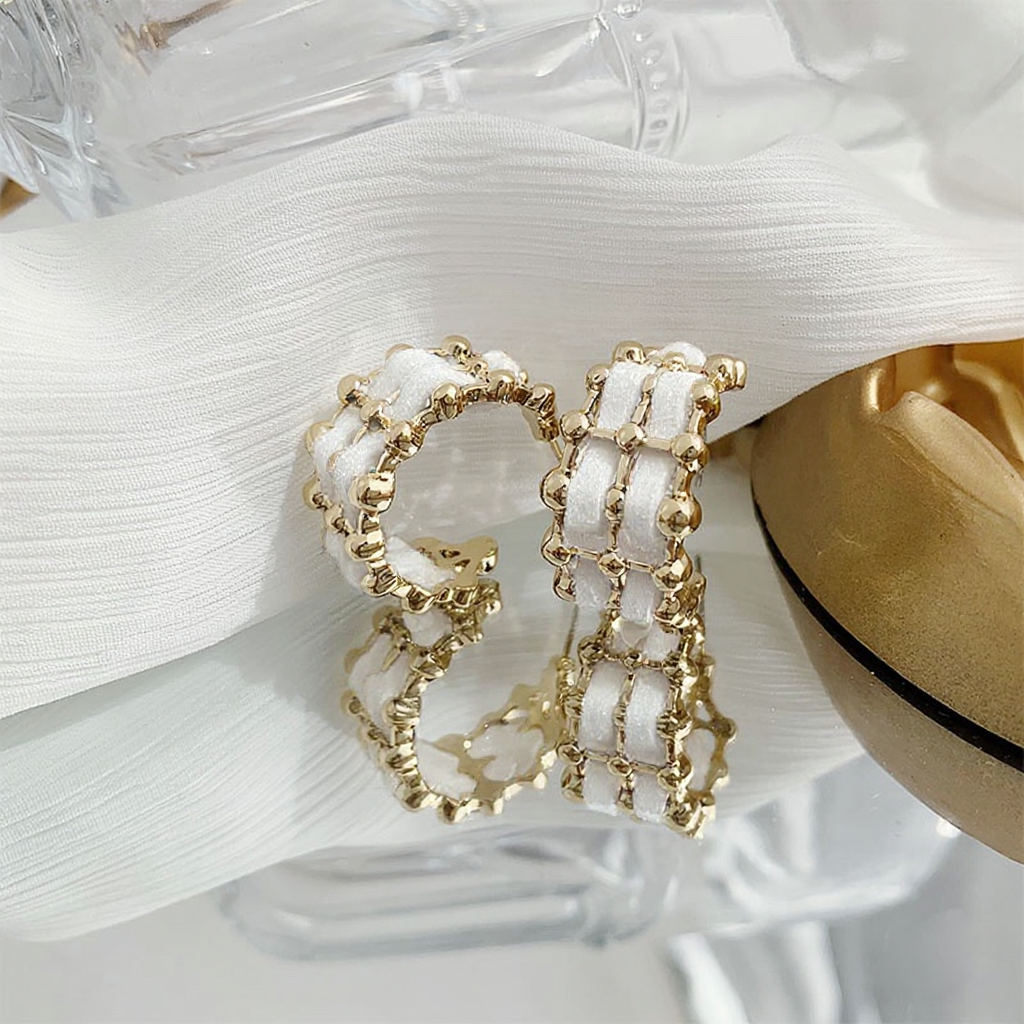 Gold hoop earrings with white stones 